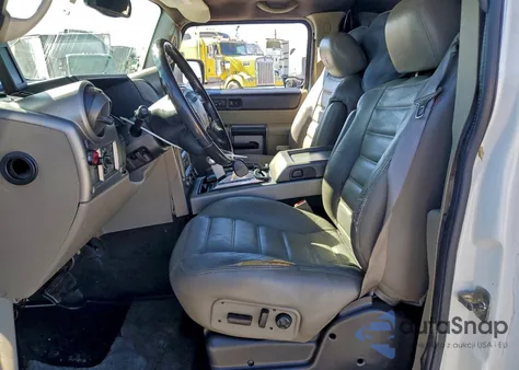 2003 Hummer H2 z USA, uszkodzony, nr VIN 5GRGN23U33H129686